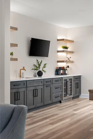 a building outdoor space with patio couch and a fireplace