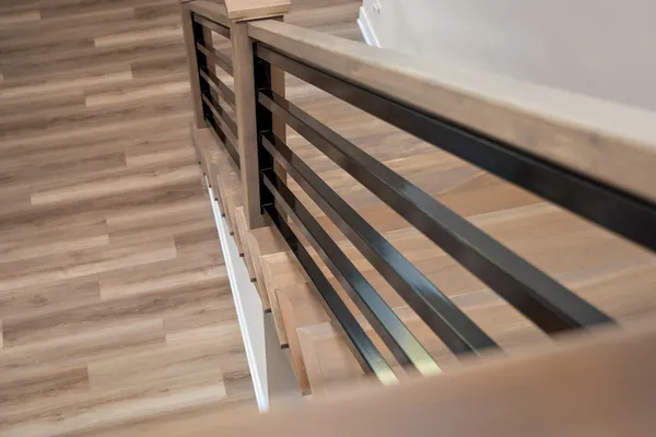 a spacious bathroom with a double vanity sink toilet and a mirror