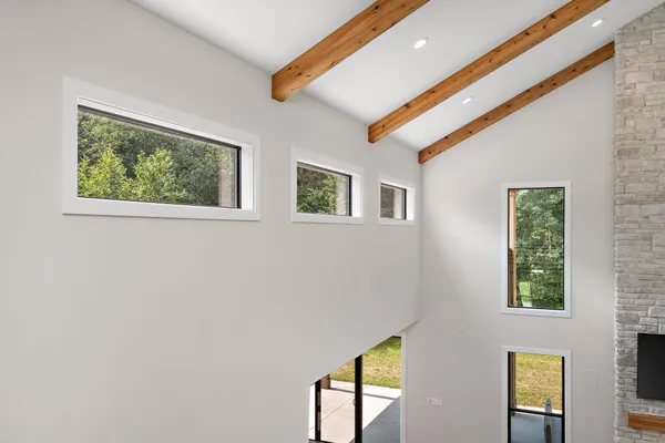 a room with furniture and a flat screen tv