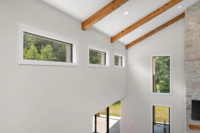 a room with furniture and a flat screen tv