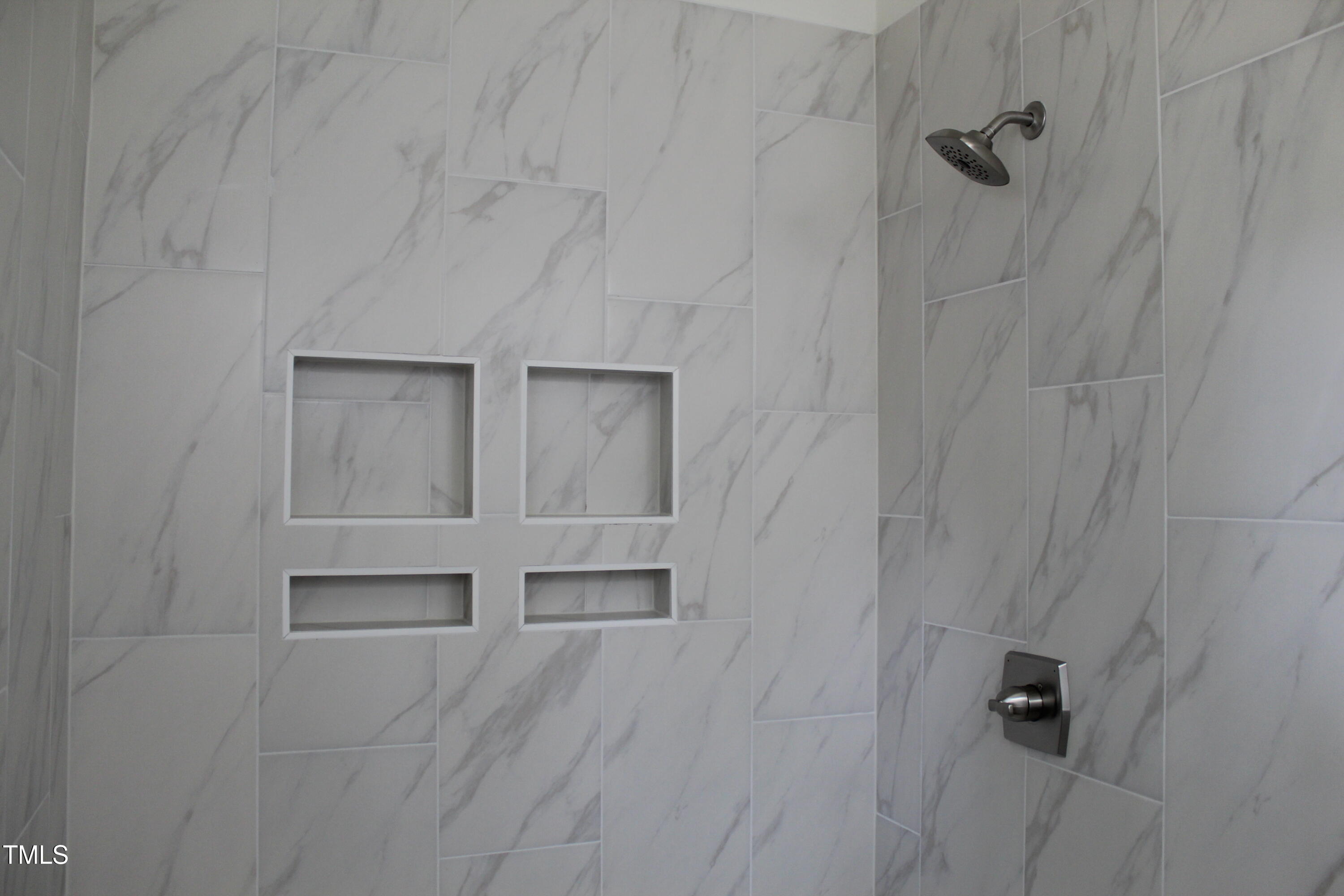 4511 Denfield Street Durham, NC 27704 - Photo 12 of 40 a view of walk in closet