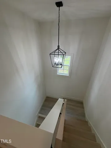 a view of a room with a hallway