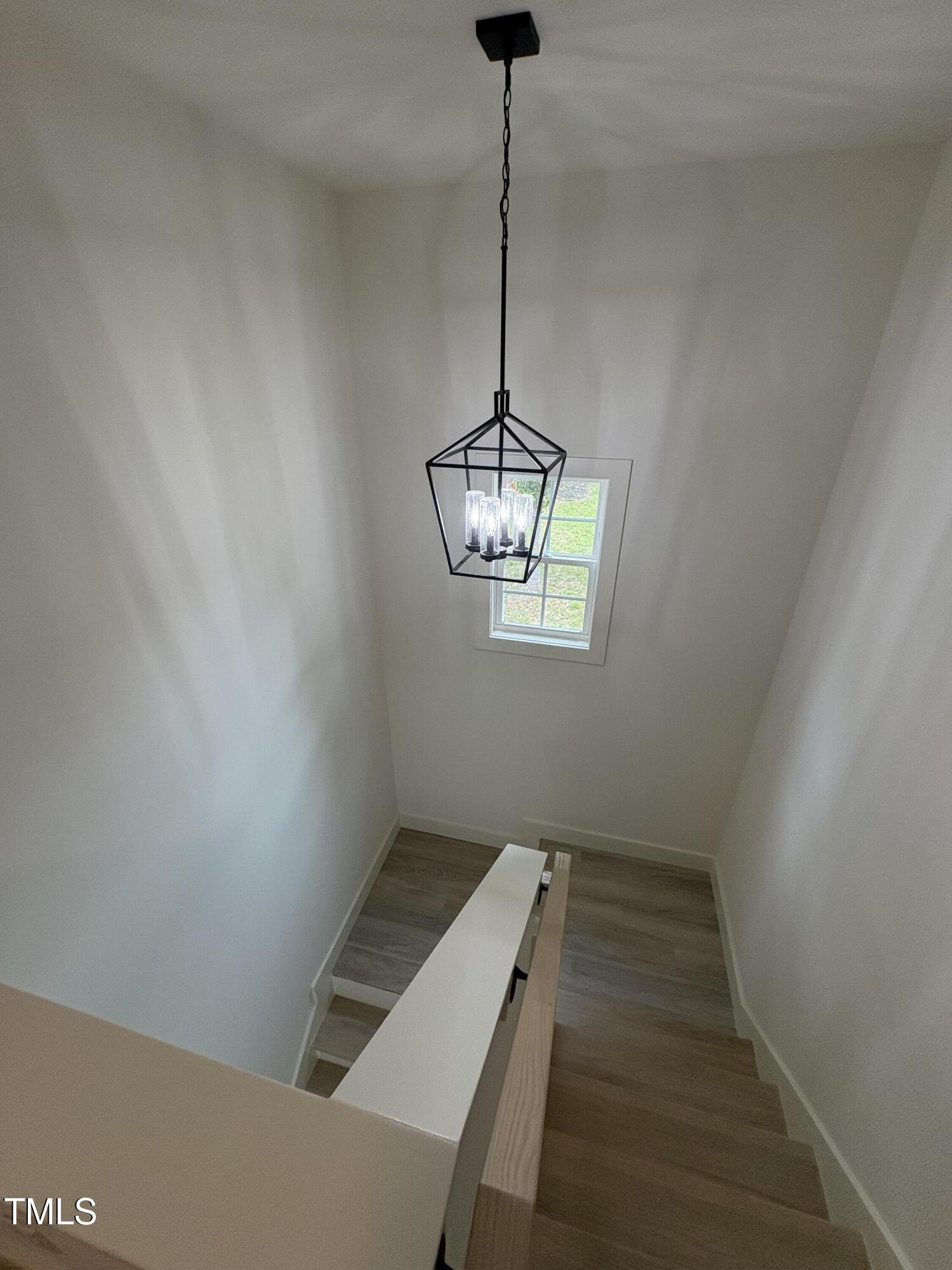 4511 Denfield Street Durham, NC 27704 - Photo 15 of 40 a view of a room with a hallway