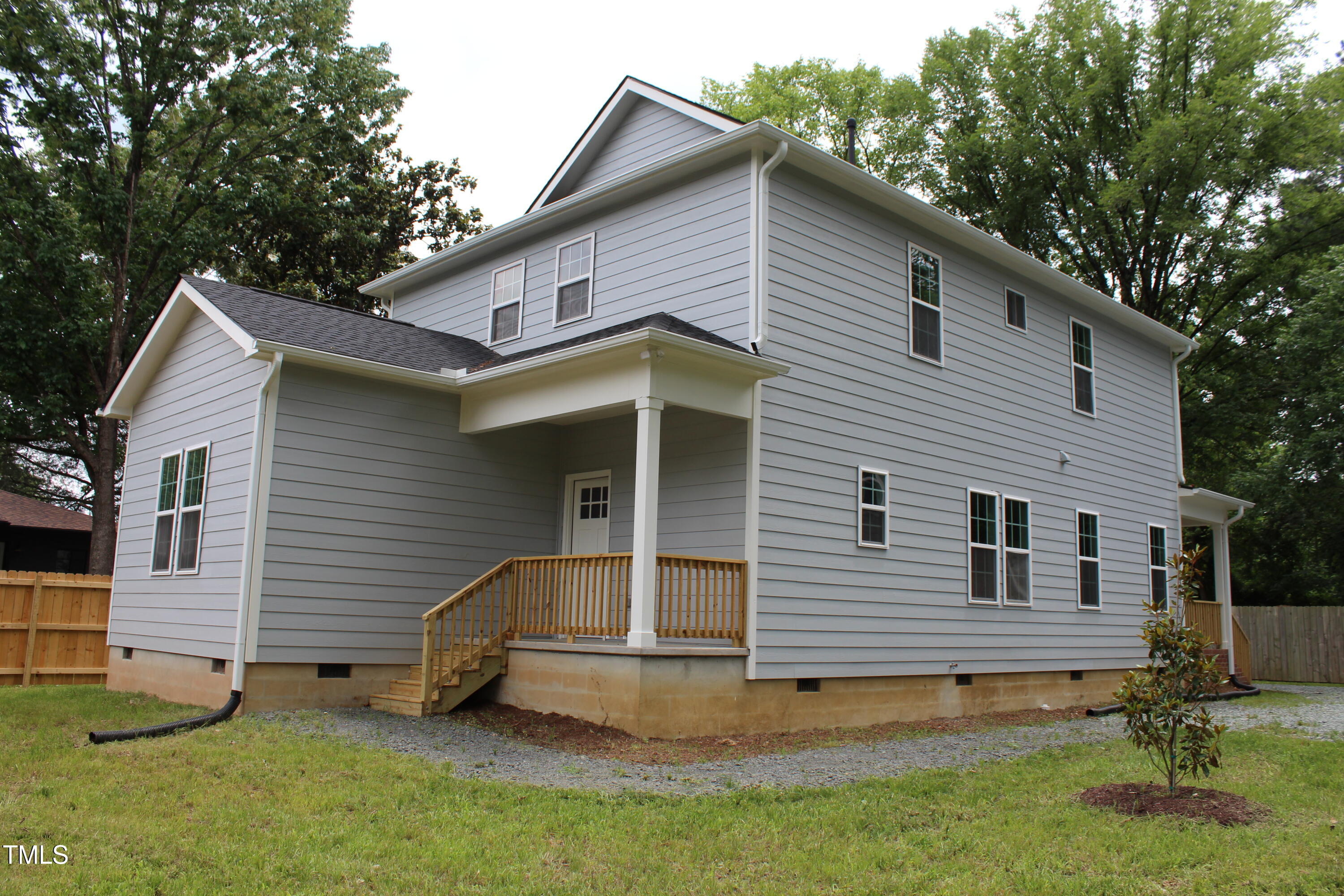 4511 Denfield Street Durham, NC 27704 - Photo 27 of 40 a view of a house with a yard