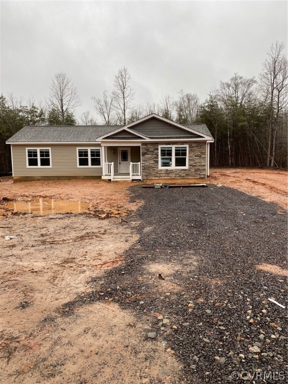 1029 Jackson Road Bumpass, VA 23024 - Photo 1 of 21 a front view of a house with a yard