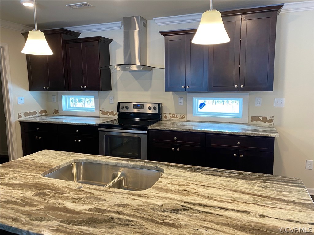 1029 Jackson Road Bumpass, VA 23024 - Photo 2 of 21 a kitchen with stainless steel appliances granite countertop wooden cabinets a stove a sink and a refrigerator