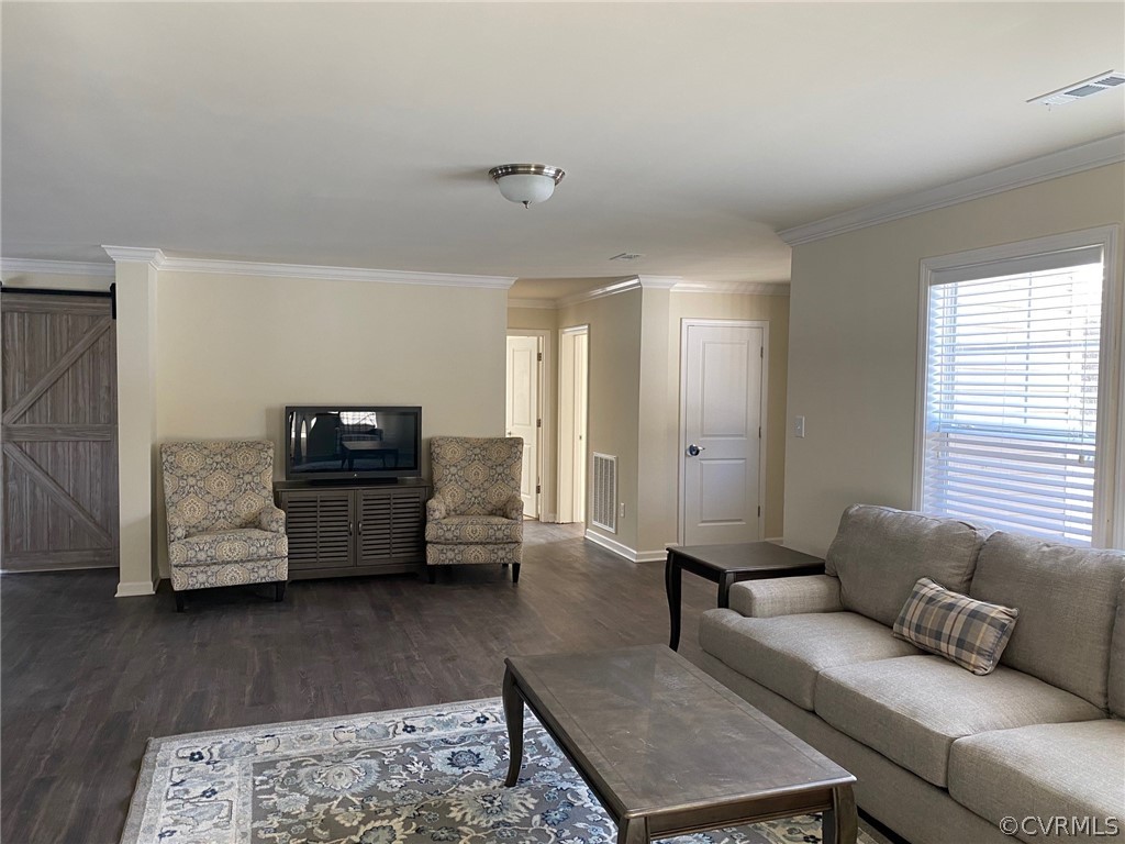 1029 Jackson Road Bumpass, VA 23024 - Photo 10 of 21 a living room with furniture and wooden floor