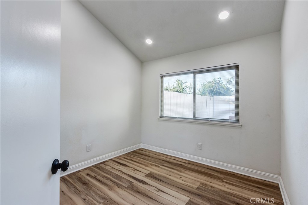11721 Mt Sterling Court Rancho Cucamonga, CA 91737 - Photo 14 of 38 a view of a room with wooden floor and window