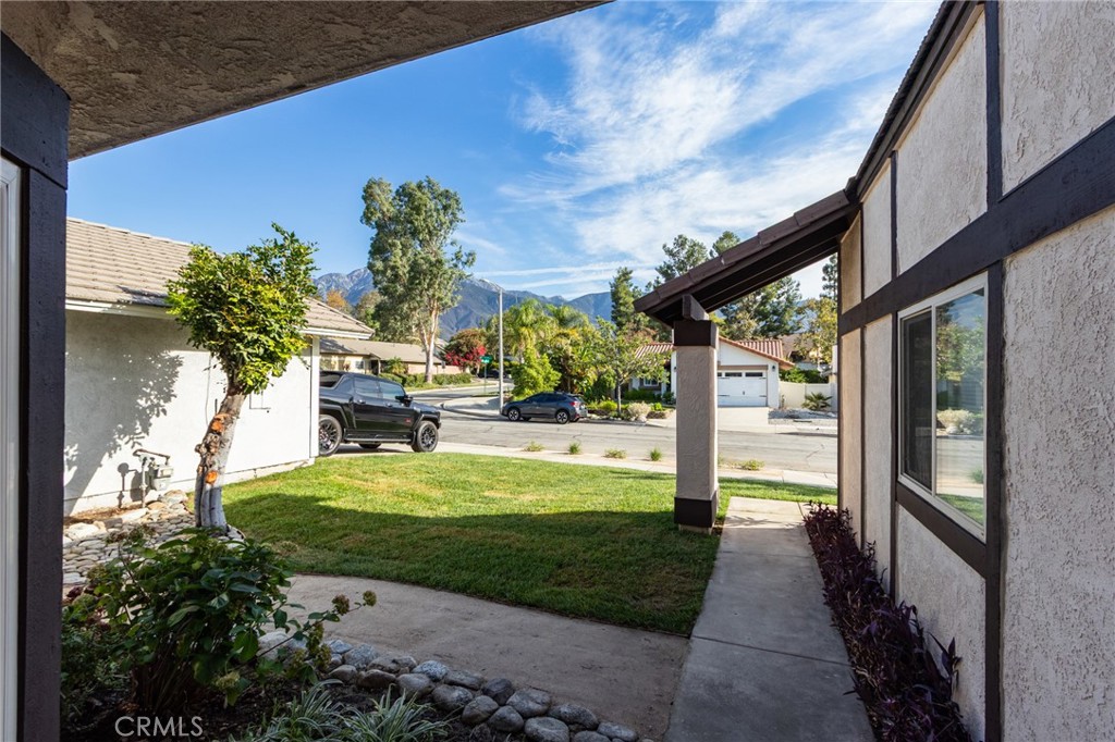 11721 Mt Sterling Court Rancho Cucamonga, CA 91737 - Photo 2 of 38 a view of a porch with a yard