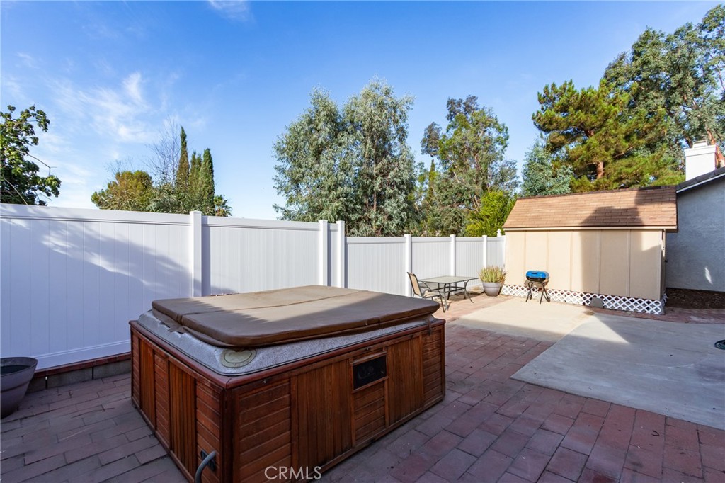 11721 Mt Sterling Court Rancho Cucamonga, CA 91737 - Photo 32 of 38 a backyard of a house with yard and outdoor seating