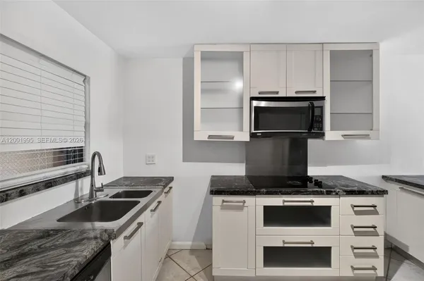 $449,900 | 1250 Lincoln Road, Unit 404, Miami Beach, FL 33139