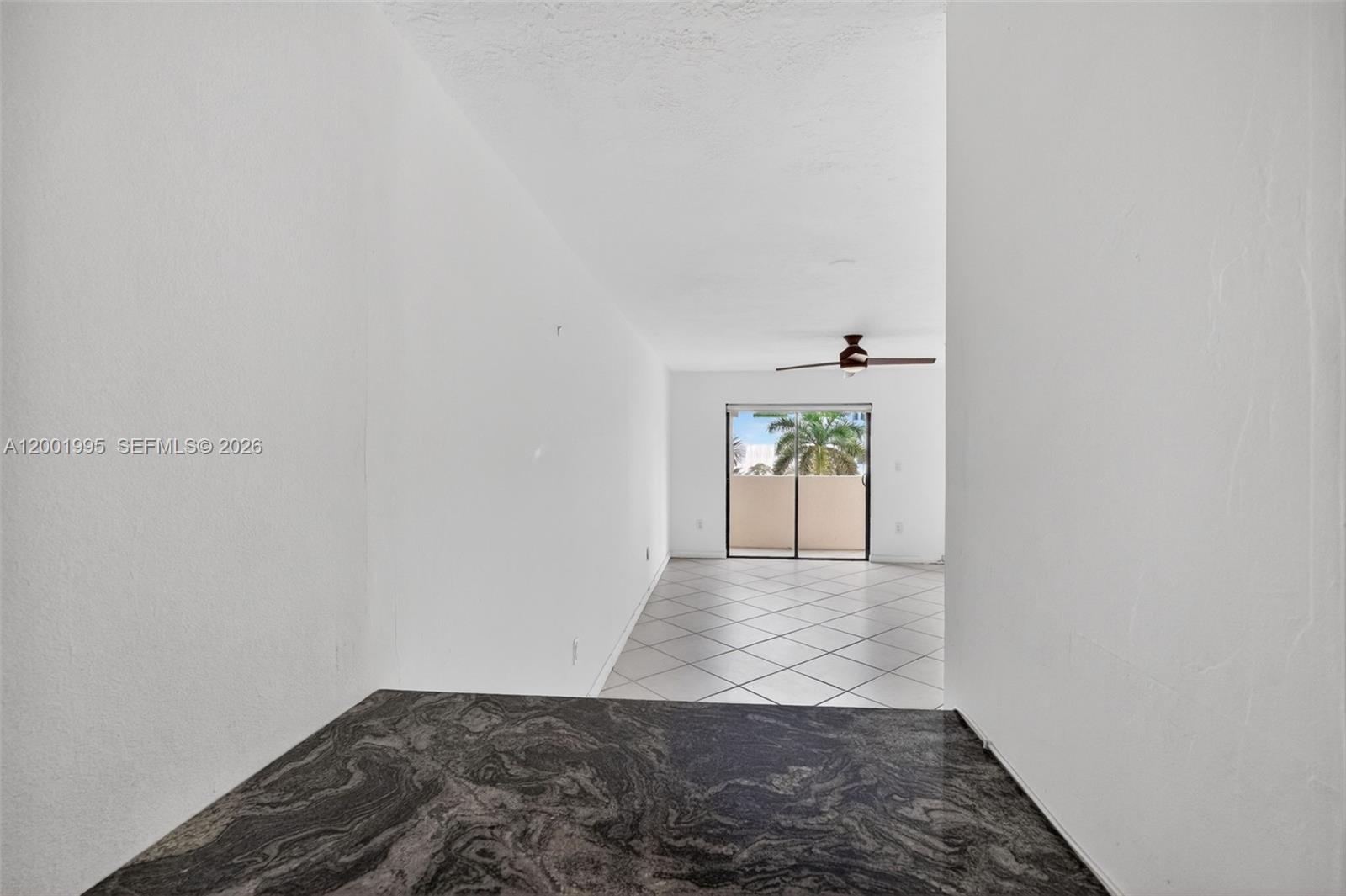 1250 Lincoln Road, Unit 404 Miami Beach, FL 33139 - Photo 10 of 35 Pass thru kitchen