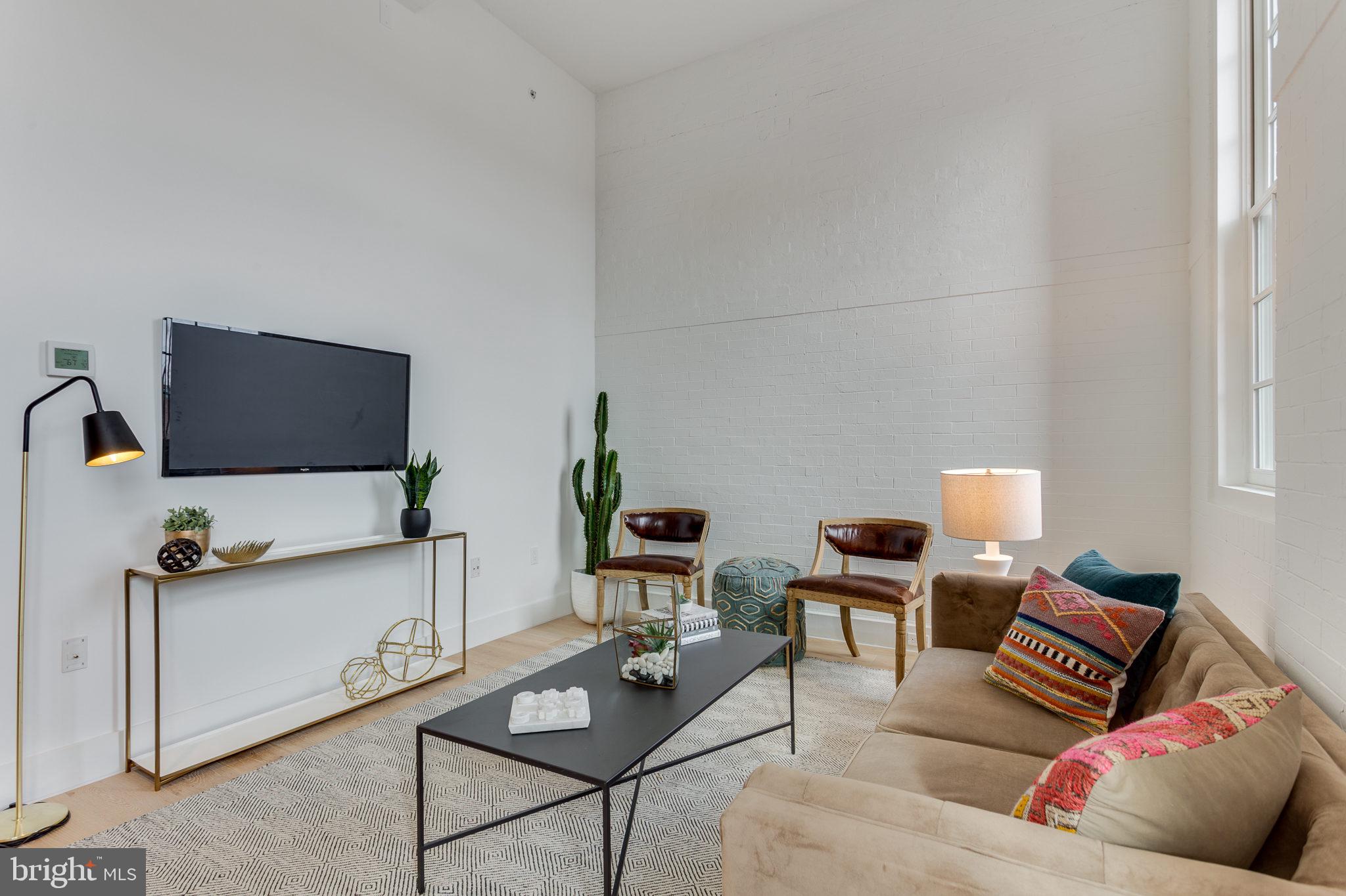 1324 E Street Southeast, Unit 203 Washington, DC 20003 - Photo 4 of 27 Exposed brick in the historic building