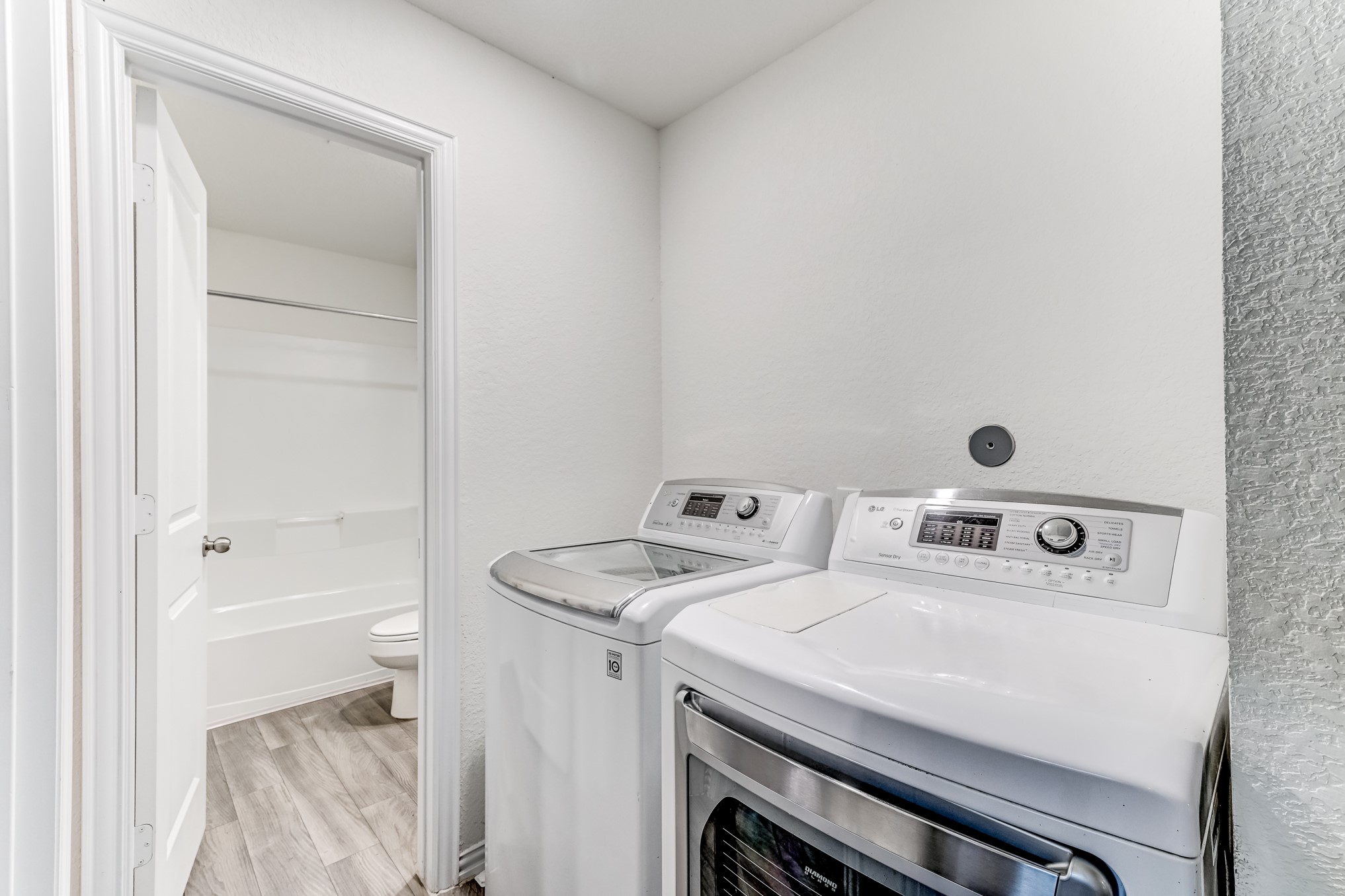 7925 Way Street, Unit A Houston, TX 77028 - Photo 18 of 29 a utility room with dryer and washer