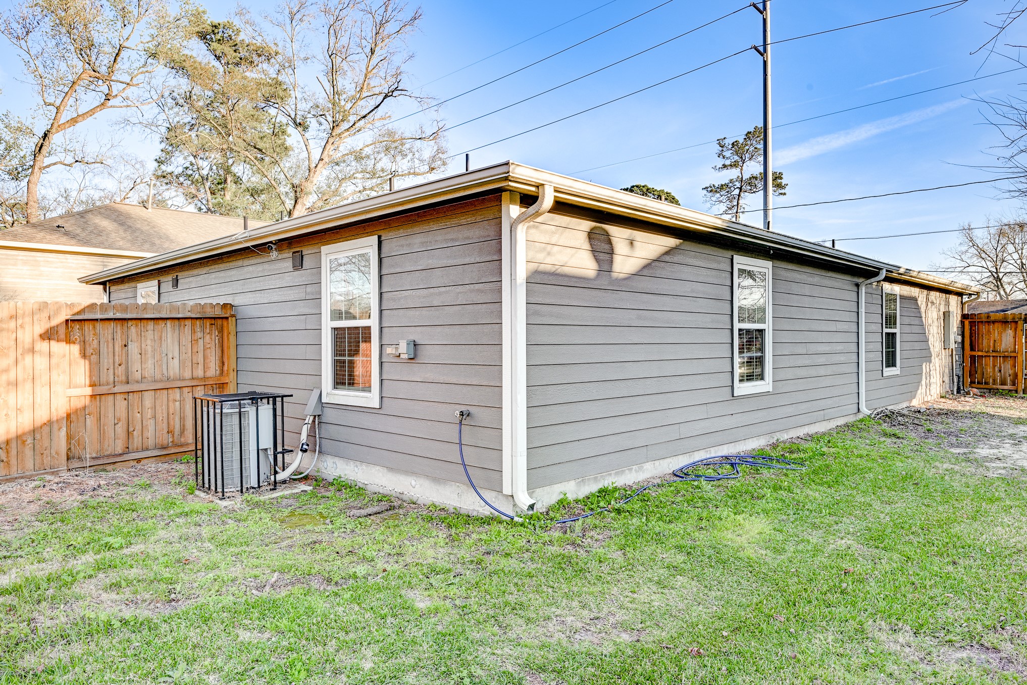 7925 Way Street, Unit A Houston, TX 77028 - Photo 28 of 29 a front view of a house with a garden