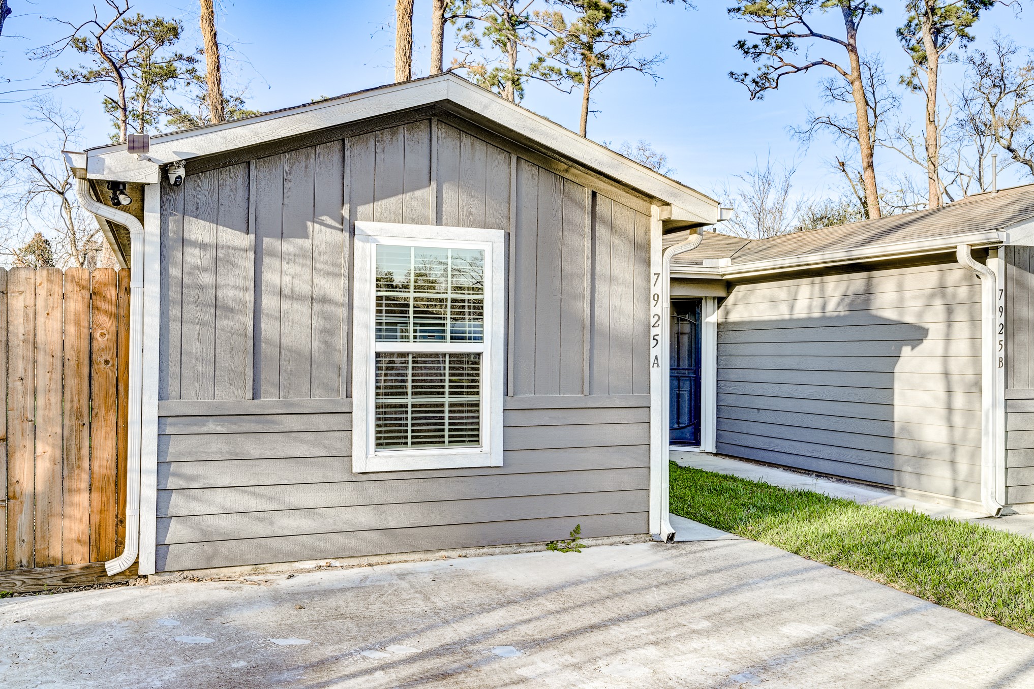 7925 Way Street, Unit A Houston, TX 77028 - Photo 4 of 29 a front view of a house with a yard
