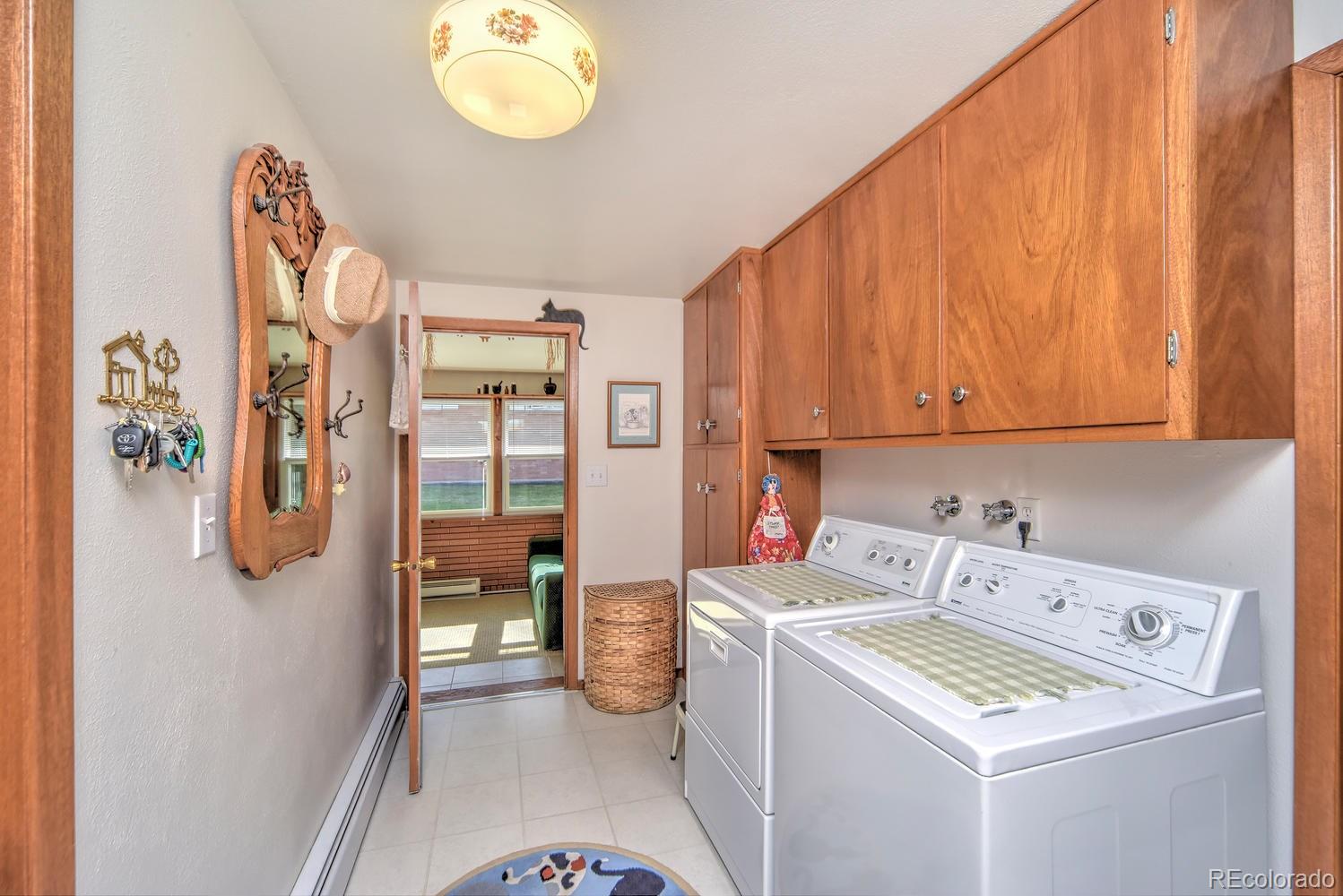 2219 Riviera Place Longmont, CO 80501 - Photo 12 of 19 a utility room with dryer and washer
