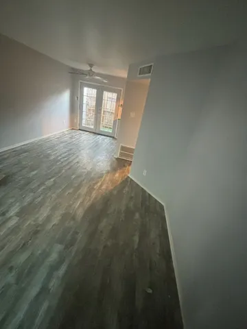 a view of balcony and wooden floor