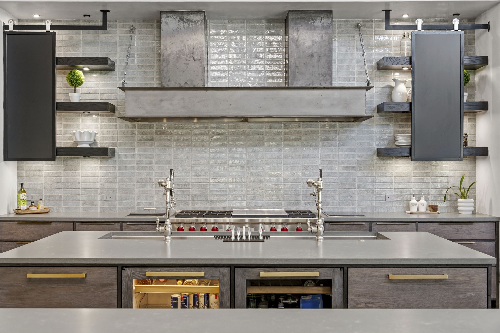 27006 Star Gazer Way Spring, TX 77386 - Photo 16 of 50 Built for culinary excellence with a 60-inch Wolf dual-fuel range featuring griddle and double ovens, Wolf induction two-burner cooktop, Wolf fryer, warming drawer, and custom I-beam vent hood.