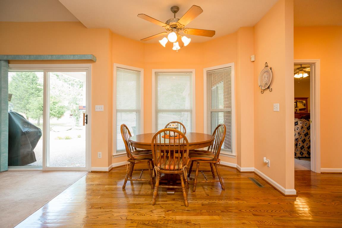 1066 Harkreader Road Mount Juliet, TN 37122 - Photo 20 of 30 a view of a dining room with furniture and wooden floor