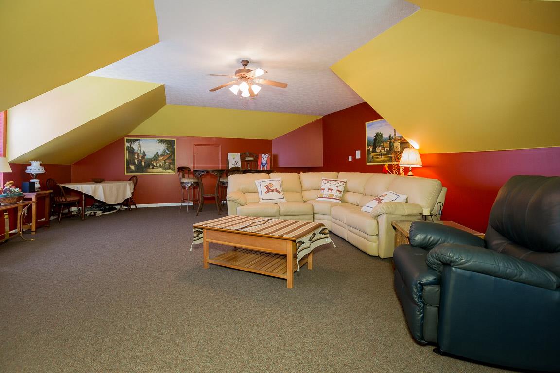 1066 Harkreader Road Mount Juliet, TN 37122 - Photo 29 of 30 a living room with furniture and a chandelier