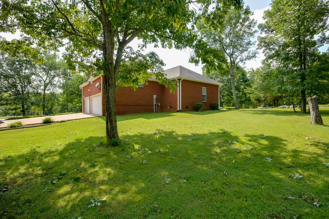 1066 Harkreader Road Mount Juliet, TN 37122 - Photo 6 of 30 a backyard of a house with lots of green space