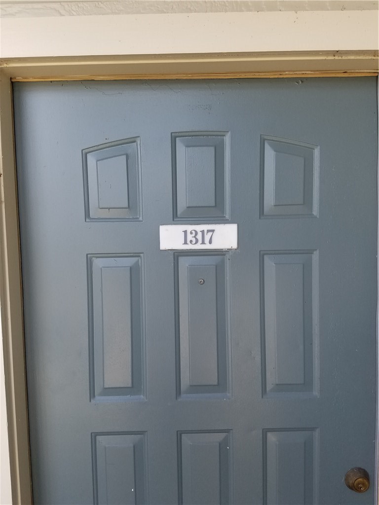 2450 Wickersham Lane, Unit 1317 Austin, TX 78741 - Photo 15 of 20 a front view of a house