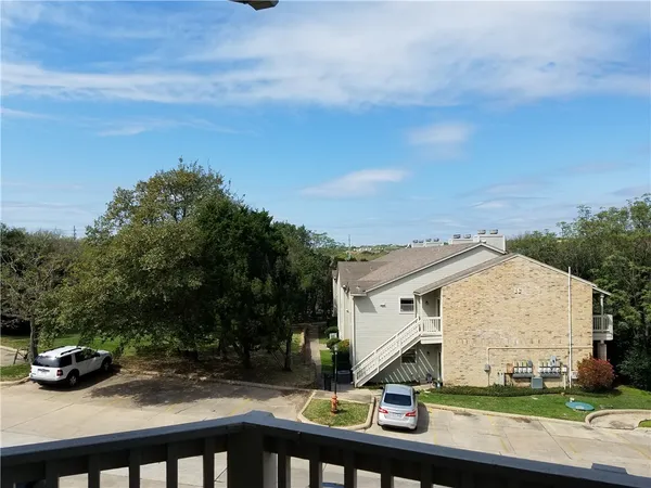 a view of a house with a park