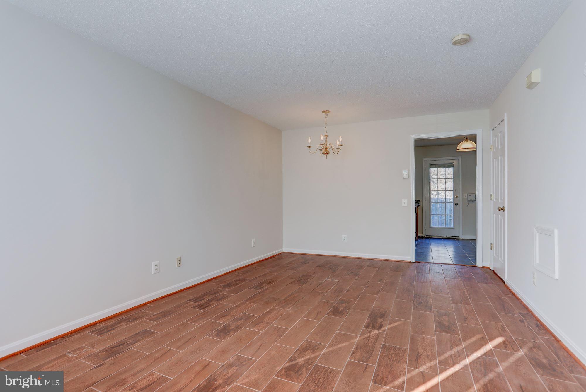2469 Fox Trot Terrace Reston, VA 20191 - Photo 2 of 26 LIVING/DINING ROOM