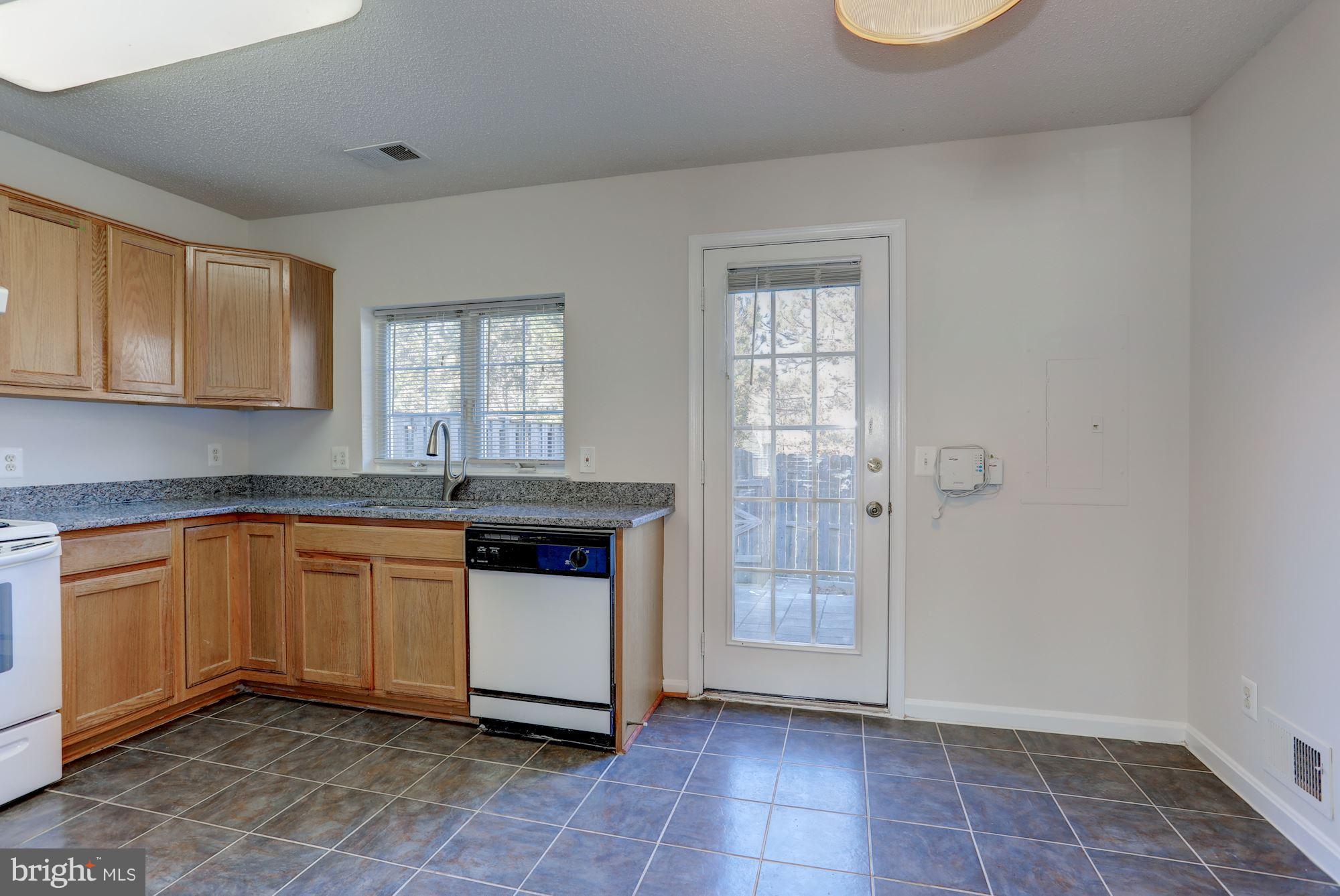 2469 Fox Trot Terrace Reston, VA 20191 - Photo 10 of 26 KITCHEN AND BREAKFAST ROOM