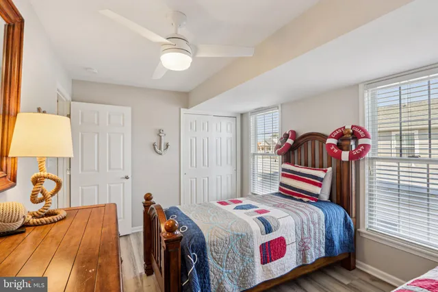 a bathroom with a sink toilet and mirror