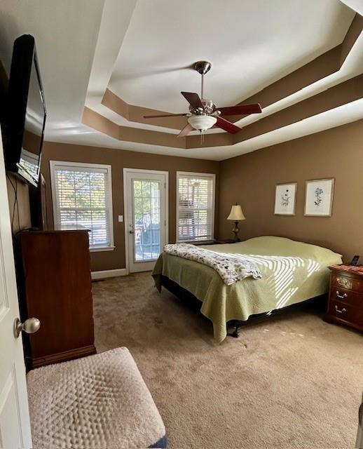 140 Washington Street Southeast Calhoun, GA 30701 - Photo 14 of 24 a bedroom with a large bed and a flat tv screen