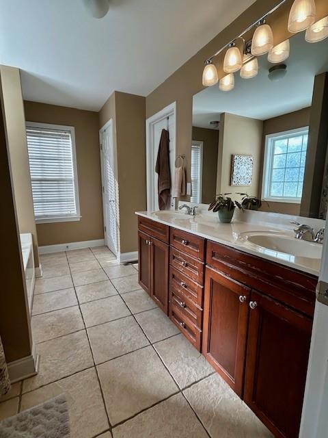 140 Washington Street Southeast Calhoun, GA 30701 - Photo 15 of 24 a spacious bathroom with a granite countertop sink a mirror and a toilet