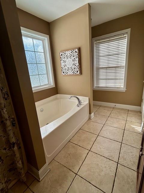 140 Washington Street Southeast Calhoun, GA 30701 - Photo 17 of 24 a bathroom with a bathtub and a shower
