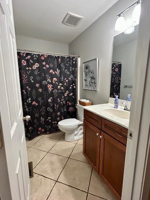 140 Washington Street Southeast Calhoun, GA 30701 - Photo 18 of 24 a bathroom with a sink a toilet a mirror a vanity and shower