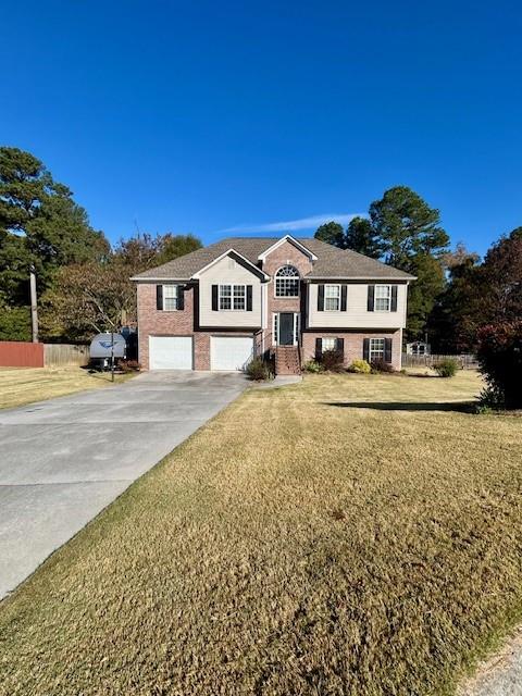 140 Washington Street Southeast Calhoun, GA 30701 - Photo 2 of 24 a front view of a house with a yard