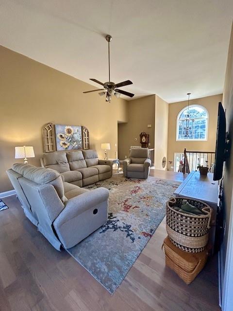 140 Washington Street Southeast Calhoun, GA 30701 - Photo 5 of 24 a living room with furniture a rug and a wall painting