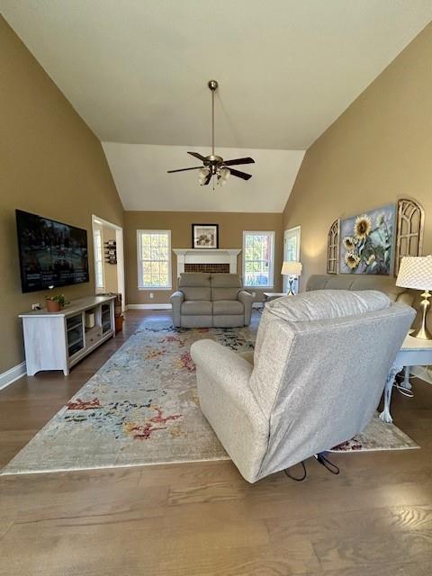 140 Washington Street Southeast Calhoun, GA 30701 - Photo 6 of 24 a living room with fireplace furniture and a flat screen tv