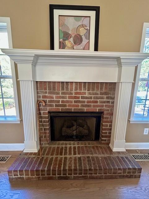 140 Washington Street Southeast Calhoun, GA 30701 - Photo 7 of 24 a living room with a fireplace and a window