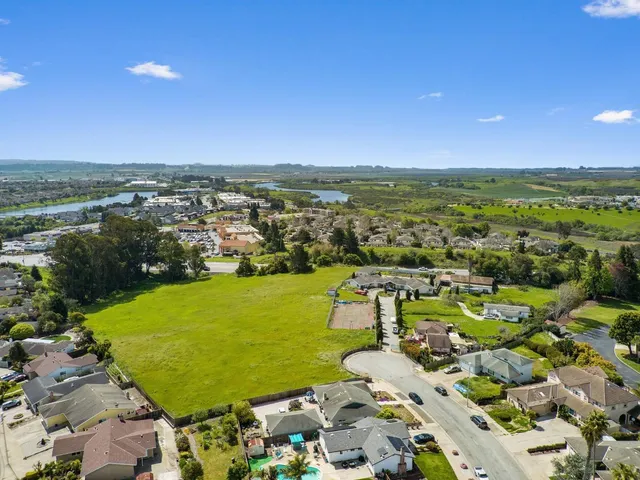 a view of a city with an ocean view