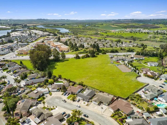 a view of a city with an ocean