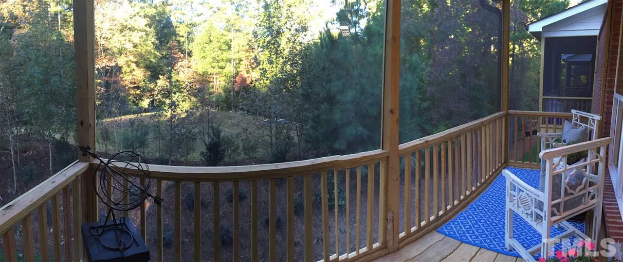 840 The Village Circle Raleigh, NC 27615 - Photo 8 of 17 a view of a balcony with wooden fence