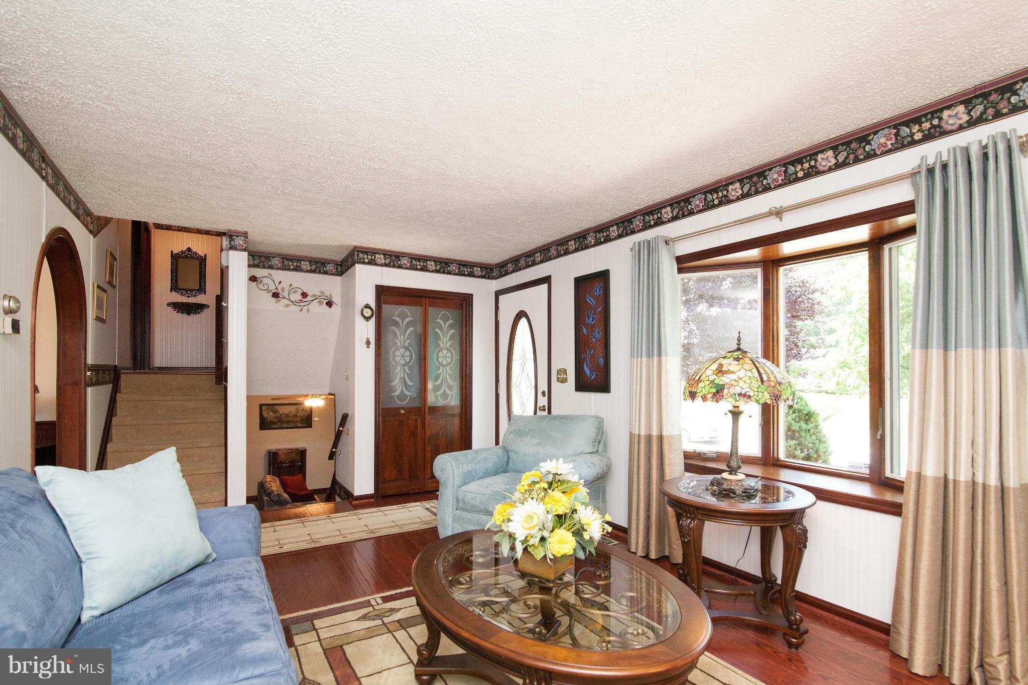 6151 Oklahoma Road Sykesville, MD 21784 - Photo 2 of 23 a living room with furniture and a large window