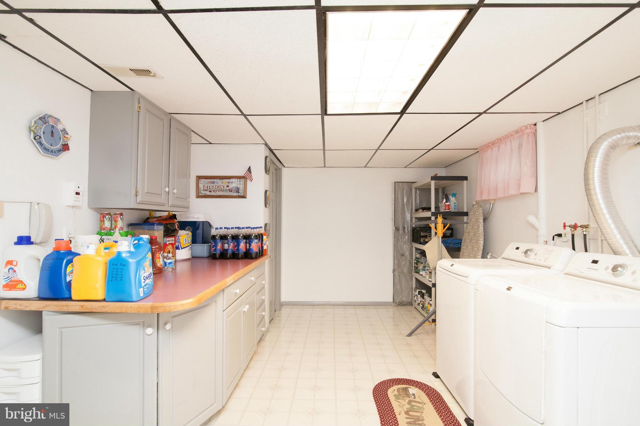 6151 Oklahoma Road Sykesville, MD 21784 - Photo 12 of 23 a view of storage and utility room with washer and dryer