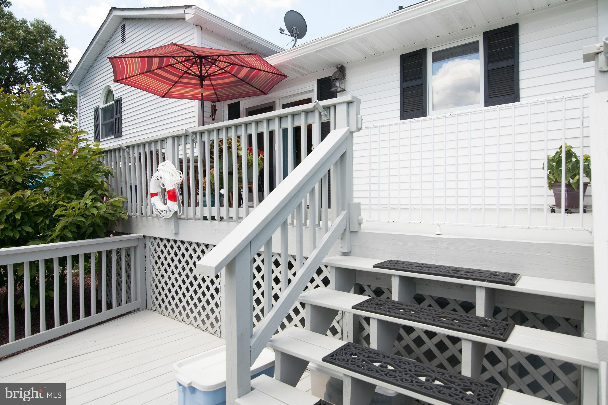 6151 Oklahoma Road Sykesville, MD 21784 - Photo 14 of 23 a view of a balcony with wooden floor