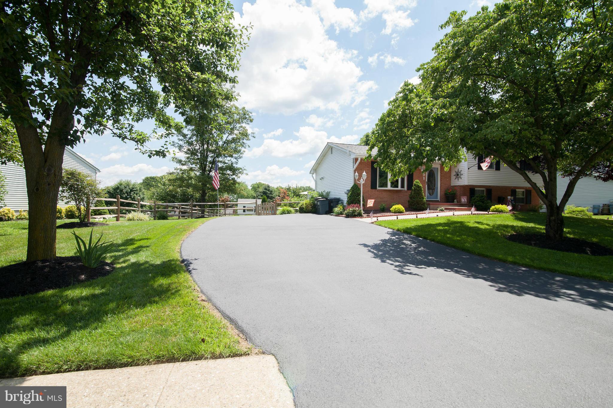 6151 Oklahoma Road Sykesville, MD 21784 - Photo 22 of 23 a view of a park with large trees