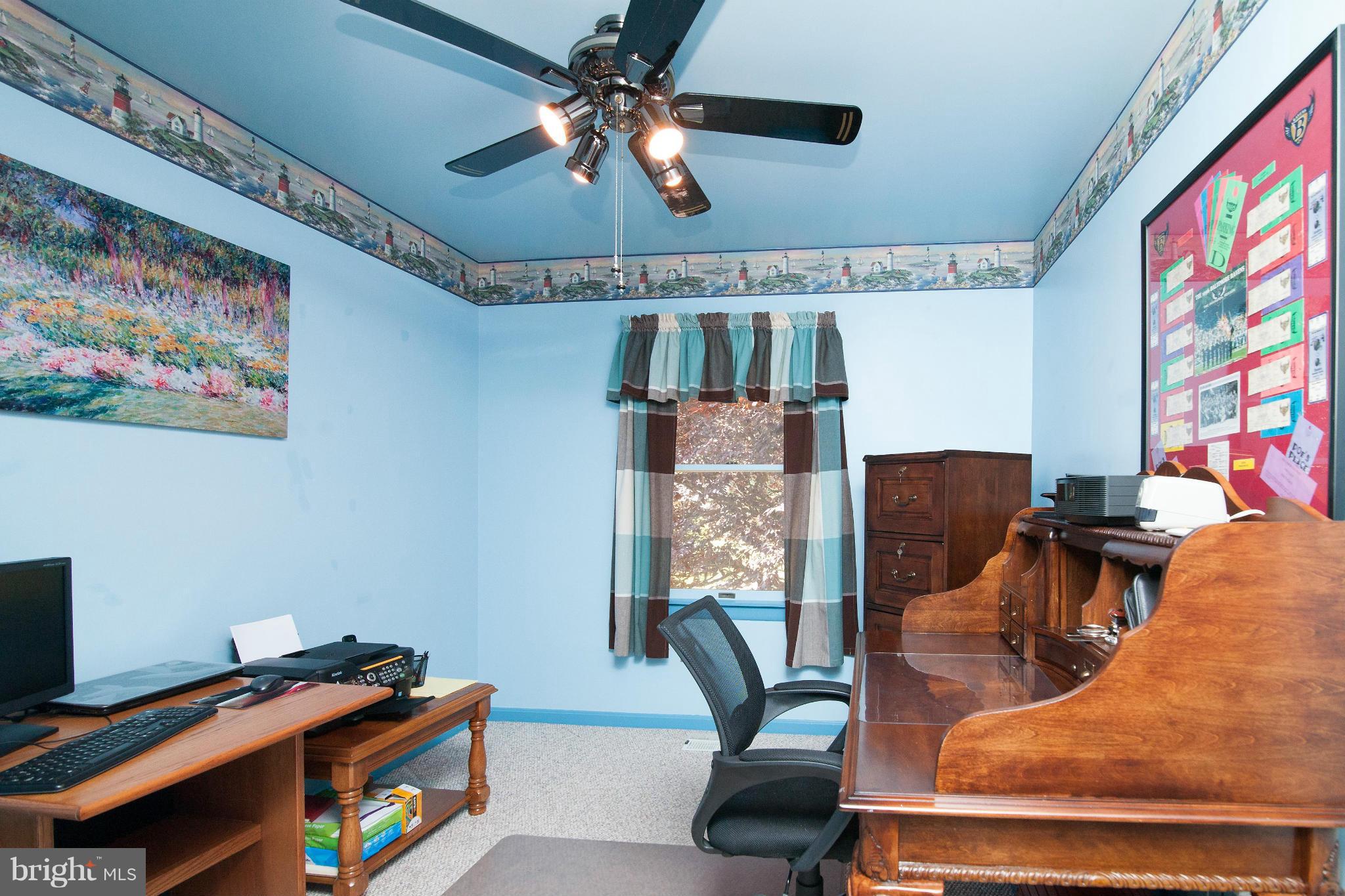 6151 Oklahoma Road Sykesville, MD 21784 - Photo 8 of 23 a living room with furniture and a flat screen tv