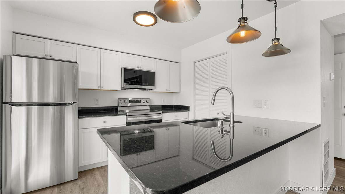 1111 Ginger Road Lake Ozark, MO 65049 - Photo 15 of 43 Unit 3 Kitchen