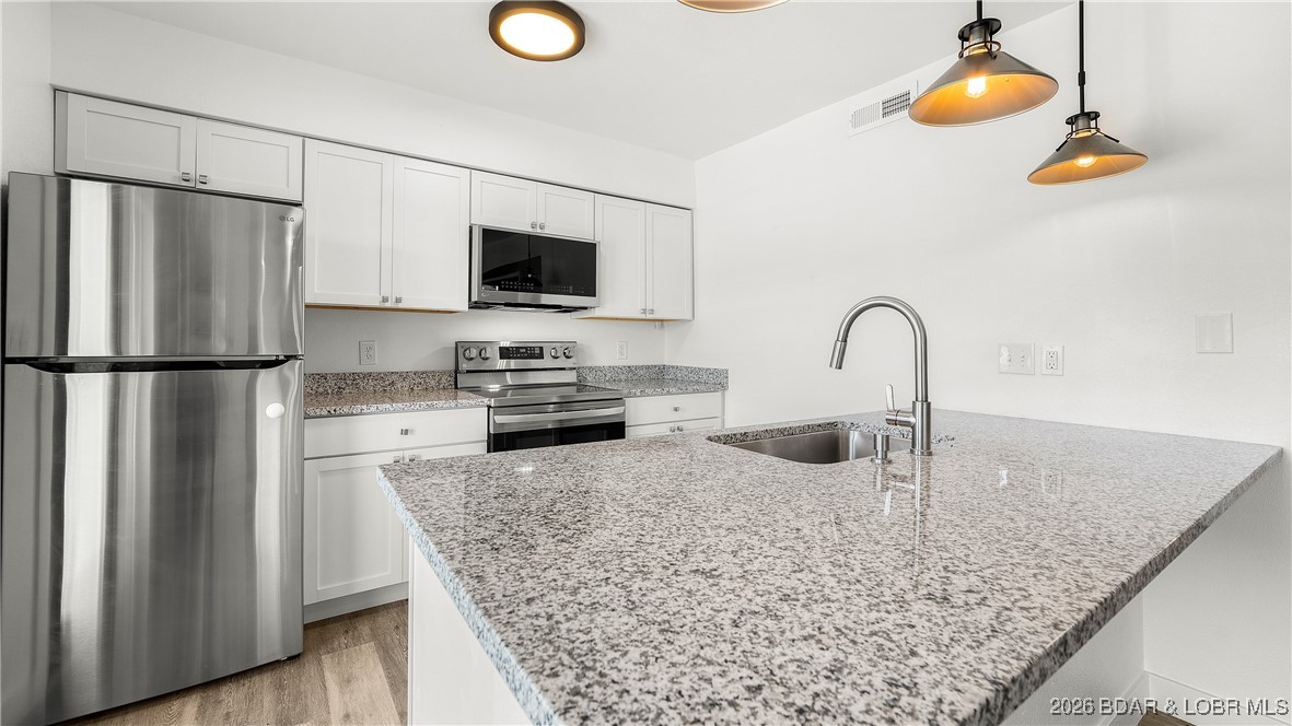 1111 Ginger Road Lake Ozark, MO 65049 - Photo 4 of 43 Unit 2 Kitchen