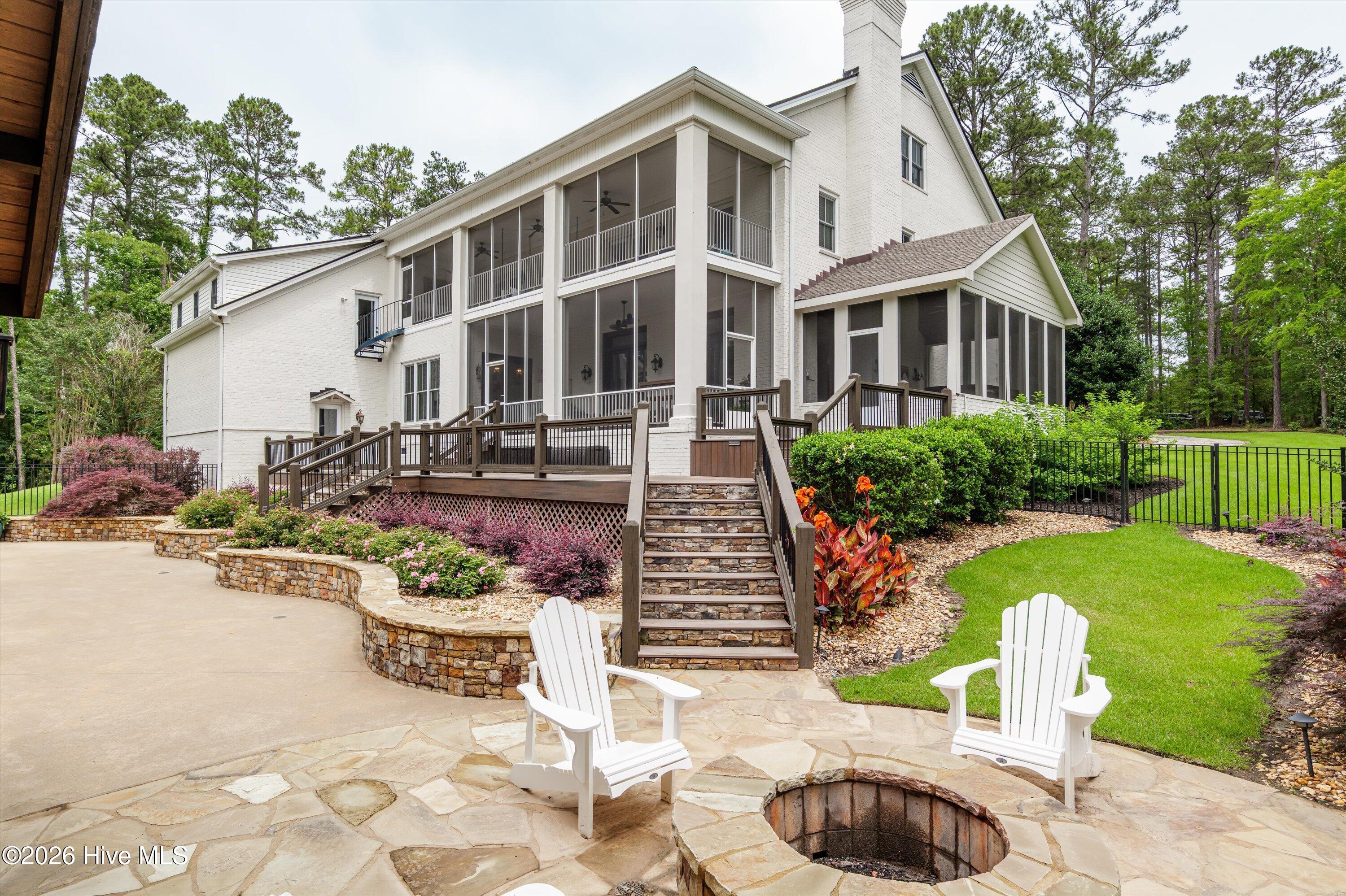 6218 Columbia Road Appling, GA 30802 - Photo 66 of 97 Fire pit area off of covered pavilion outdoor kitchen area